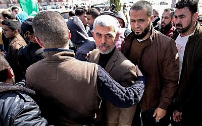Yahya Sinwar (C), the new leader of Hamas in the Gaza Strip, arrives for the opening of a new mosque in Rafah in the southern Gaza Strip on February 24, 2017. (AFP/Said Khatib)