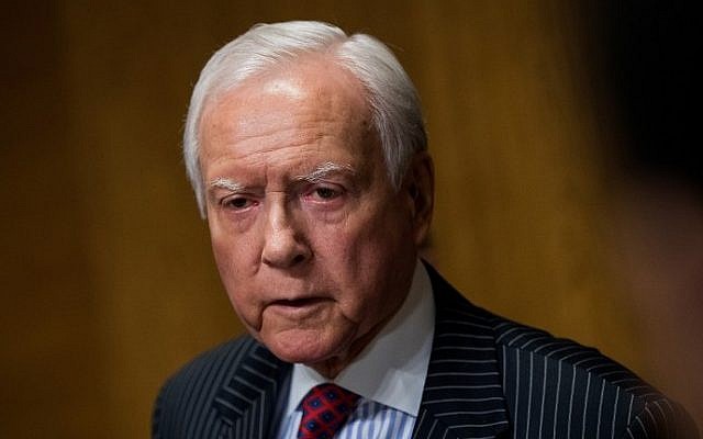 Committee chairman Orrin Hatch (R-UT) speaks with reporters following a meeting of the Senate Finance Committee to vote on the nominations of cabinet nominees Tom Price and Steve Mnuchin, on Capitol Hill, February 1, 2017 in Washington, DC.  (Drew Angerer/Getty Images/AFP)