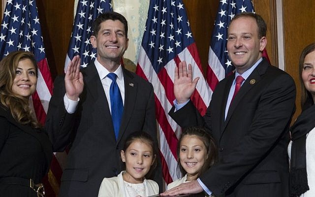Rep. Lee Zeldin, R-NY, takes the oath of office during a mock swearing in ceremony on Capitol Hill in Washington, Tuesday, Jan. 3, 2017. (AP Photo/Jose Luis Magana)