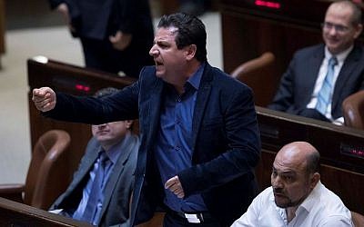 Joint (Arab) List party chairman Ayman Odeh reacts during a plenum session in the assembly hall of the Knesset on January 25, 2017. (Yonatan Sindel/Flash90)