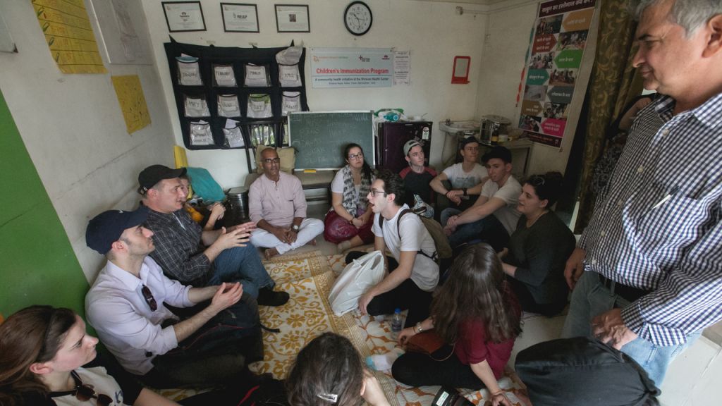 Group debriefing in the Kalwa slum, with Jacob Stockman, founder and director of the Gabriel Project Mumbai. (Courtesy)