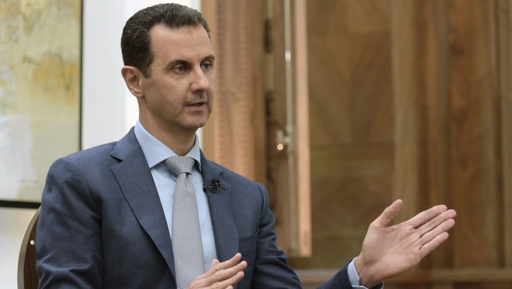 Syrian President Bashar Assad speaks during an interview with Yahoo News in Damascus, Syria, Friday, Feb. 10, 2017 (SANA via AP)