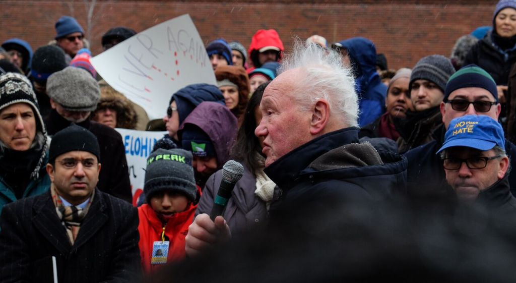 Holocaust survivor Fred Manasse speaks at the New England Holocaust Memorial in Boston, Massachusetts, during a rally in support of refugees on February 12, 2017 (Kaila Fleisig)