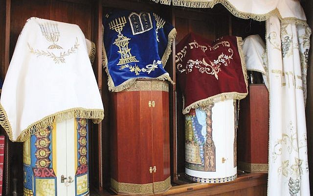 Karaite Torah scrolls are stored in the Eastern style, with the scroll enclosed in a hard case. (David A.M. Wilensky via JTA)