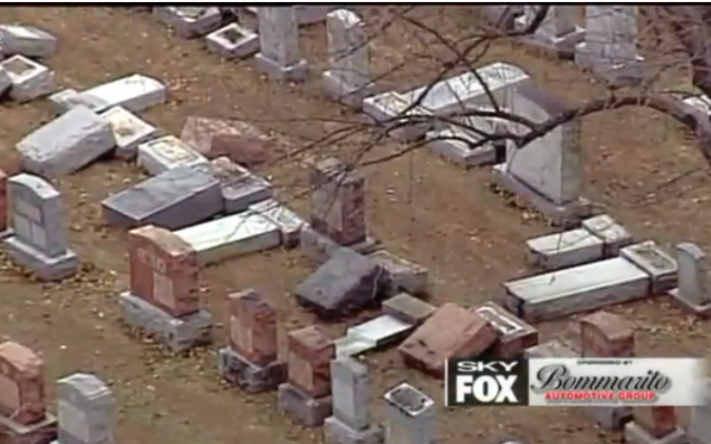 FOX2NEWS broadcasts footage of vandalized headstones at a St. Louis area Jewish cemetery. (Screenshot)