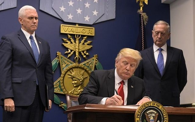 Illustrative: US President Donald Trump signing an executive order on January 27, 2017 at the Pentagon in Washington, DC. (AFP Photo/Mandel Ngan)