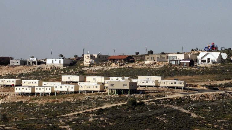 A picture taken from the Palestinian village of Sa'ir shows the Israeli settlement of Metzad on March 15, 2017. (AFP Photo/Hazem Bader)