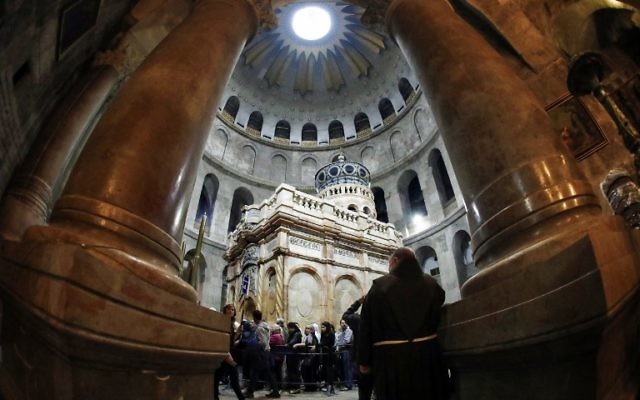A picture taken on March 21, 2017 at the Church of the Holy Sepulchre in the Old City of Jerusalem shows the renovated Edicule of the Tomb of Jesus (Thomas Coex/AFP)