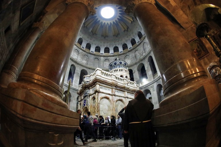 A picture taken on March 21, 2017 at the Church of the Holy Sepulchre in the Old City of Jerusalem shows the renovated Edicule of the Tomb of Jesus (Thomas Coex/AFP)