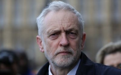 Labour Party leader Jeremy Corbyn walks along Westminster Bridge by the Houses of Parliament in central London on March 23, 2017. (AFP Photo/Daniel Leal-Olivas)