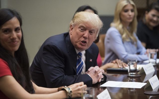 US President Donald Trump participates in a roundtable with women small business owners at the White House in Washington, DC on March 27, 2017. (Jim Watson/AFP)