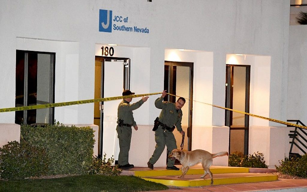Las Vegas Metropolitan Police Department K-9 officers search the Jewish Community Center of Southern Nevada after an employee received a suspicious phone call that led about 10 people to evacuate the building on February 27, 2017 in Las Vegas, Nevada. (Ethan Miller/Getty Images/AFP)