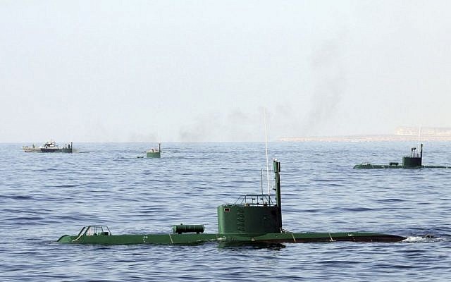 Iranian submarines and warships participate in a navy drill in the Sea of Oman in December, 2011 (AP Photo/Young Journalists Club, Mohammad Ali Marizad)