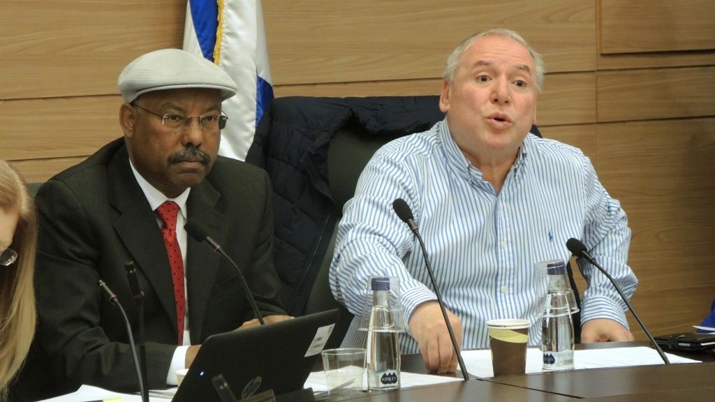 Likud MKs Avraham Neguise and David Amsalem grill representatives from the Ministry of the Interior over the Ethiopian aliyah freeze at a Knesset hearing on March 21, 2017. (Melanie Lidman/Times of Israel)