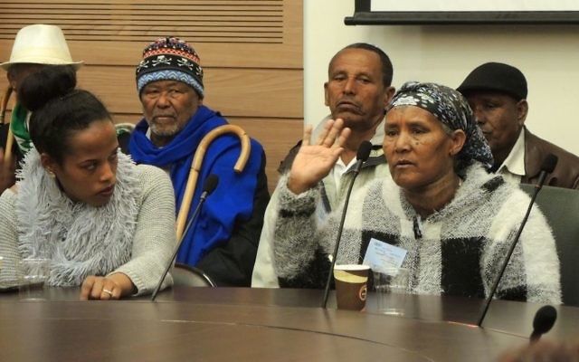 An Ethiopian-Israeli woman tells the Interior Ministry she has waited 16 years for two of her children to come to Israel at a Knesset hearing on March 21, 2017. (Melanie Lidman/Times of Israel)