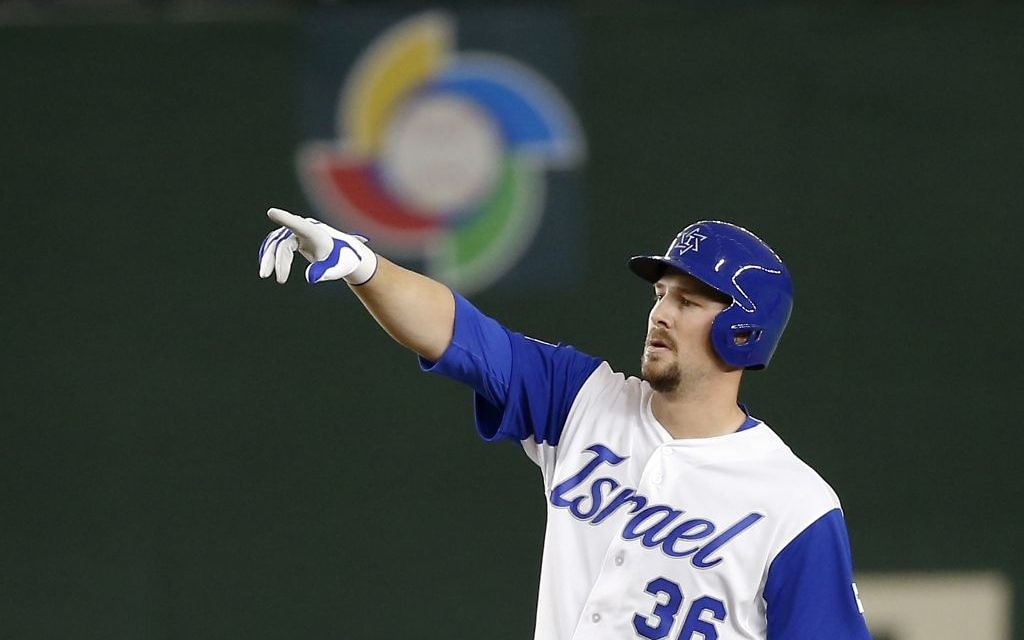 Israel's Ryan Lavarnway reacts at second after hitting a double off Cuba's starter Noelvis Entenza during the fourth inning of their second round game of the World Baseball Classic at Tokyo Dome in Tokyo, Japan, March 12, 2017. (AP/ Shizuo Kambayashi)