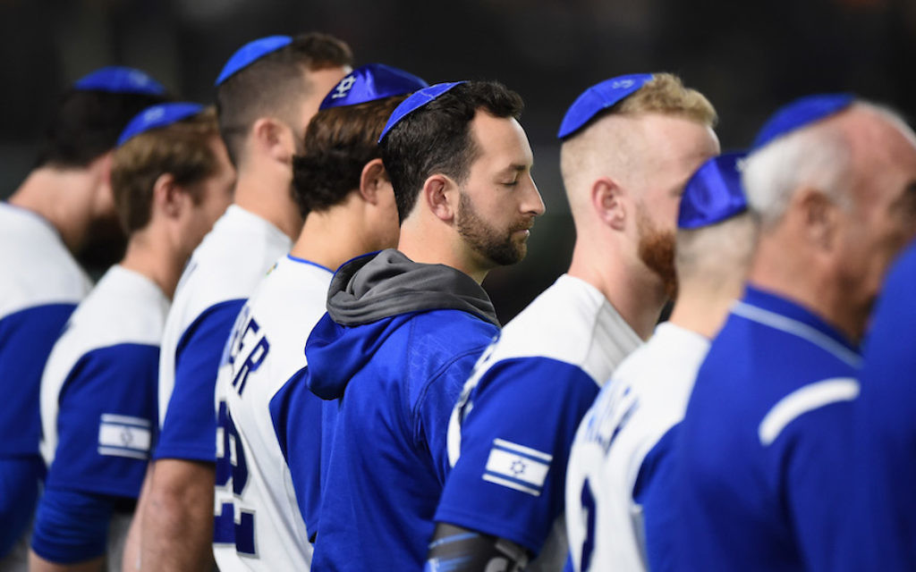 Israel players line up for the national anthem prior to the World Baseball Classic Pool E Game Three between Netherlands and Israel at the Tokyo Dome on March 13, 2017 in Tokyo, Japan.  (Photo by Matt Roberts/Getty Images via JTA)