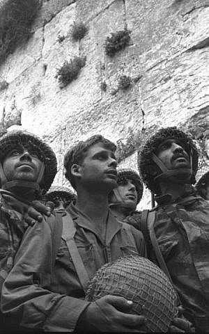 The iconic Rubinger photo of the three paratroopers at the recaptured Western Wall in June 1967 (Courtesy Rubinger/Knesset Collection)