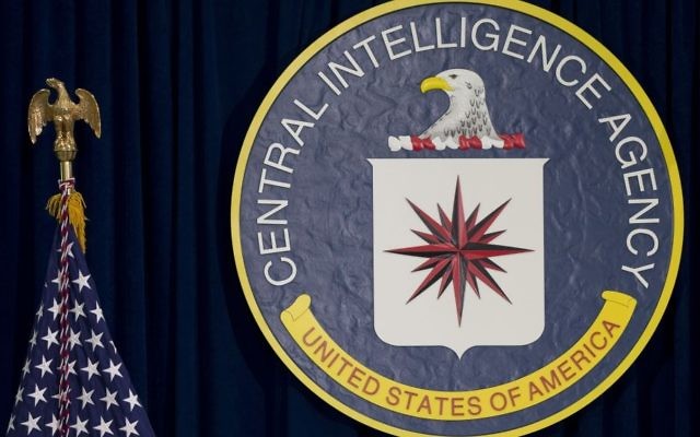 This April 13, 2016, file photo shows the seal of the Central Intelligence Agency at CIA headquarters in Langley, Va. (AP Photo/Carolyn Kaster, File)