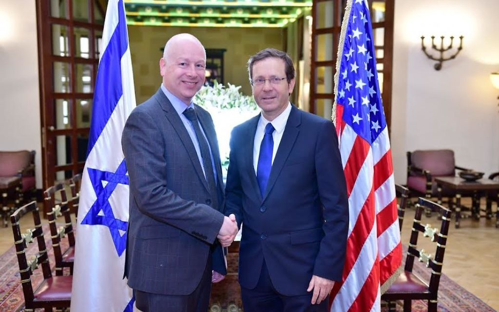 Opposition chairman Isaac Herzog (R) shakes hands with US special envoy for international negotiations Jason Greenblatt following their meeting on March 16, 2017. (Rafi Ben Hinon)