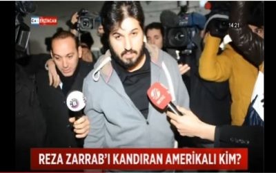 Reza Zarrab, the Turkish-Iranian gold trader accused of violating US sanctions on Iran, seen at an Istanbul police station in 2013. (screen capture: YouTube) 