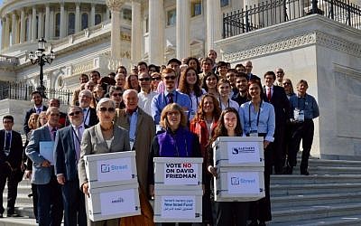 A sign of the polarization of American Jewry: J Street activists deliver a petition to the US Senate opposing the nomination of David Friedman as ambassador to Israel, February 28, 2017. (J Street/JTA)