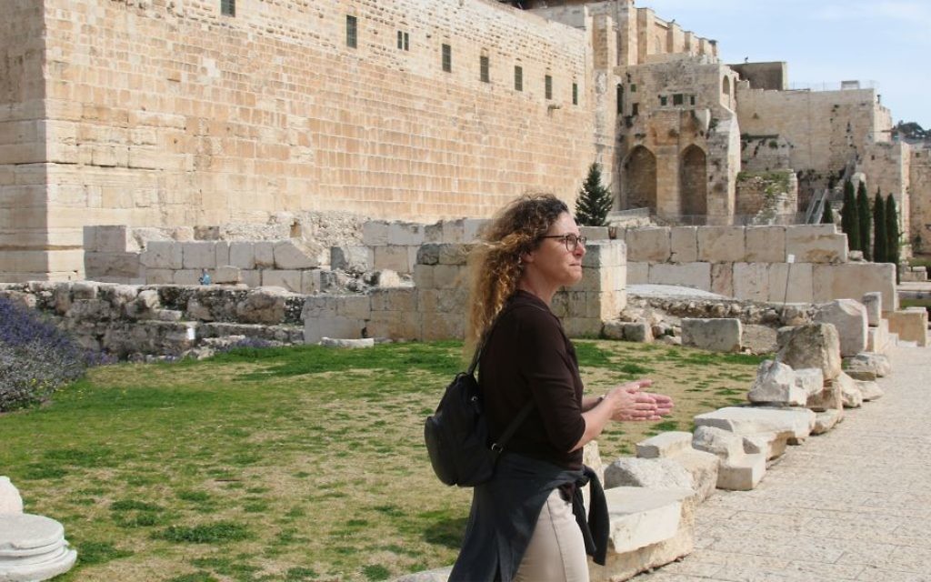 Gura Berger, spokesperson for the East Jerusalem Development Company, leads a tour group on Jerusalem's Mikveh Trail. (Shmuel Bar-Am)