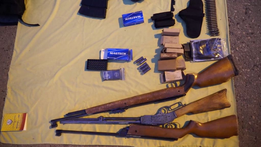 Three rifles and boxes of ammunition seized by the IDF as part of a raid in the Balata refugee camp, outside Nablus, on March 8, 2017. (IDF Spokesperson's Unit)