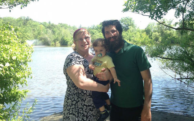Sam Zerin, with his wife Rabbi Rachel Zerin and their son, said the JCC bomb threats recalled an anti-Semitic threat his middle school received when he was 13. (Courtesy of Zerin family via JTA)