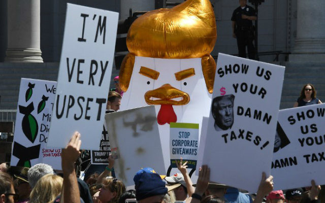 Protestors take part in the "Tax March" calling on US President Donald Trump to release his tax records in Los Angeles, California on April 15, 2017. (Mark Ralston/AFP)