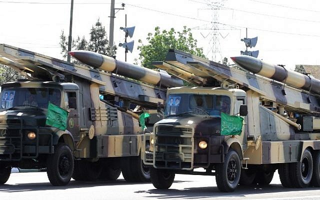 Iranian military trucks carry surface-to-air missiles during a parade on the occasion of the country's Army Day, on April 18, 2017, in Tehran. (AFP Photo/Atta Kenare)