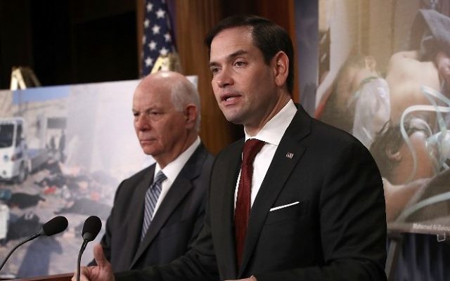 Sen. Marco Rubio (R-Florida), right, at a press conference at the US Capitol, April 5, 2017 in Washington, DC. (Win McNamee/Getty Images/AFP)