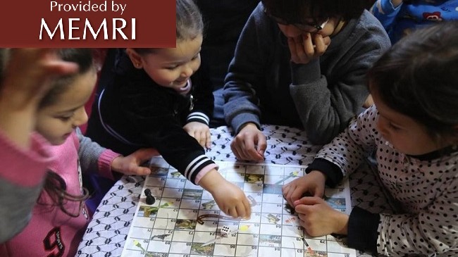 Children playing 'Reaching Jerusalem,' a Hamas inspired version of the 'Snakes and Ladders' board game. (MEMRI)