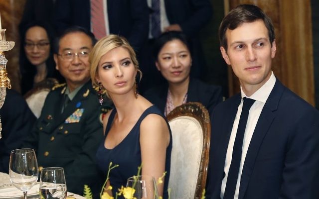 In this Thursday, April 6, 2017, photo, Ivanka Trump is seated with her husband, White House senior adviser Jared Kushner, during a dinner with President Donald Trump and Chinese President Xi Jinping, at Mar-a-Lago, in Palm Beach, Fla. (AP Photo/Alex Brandon)