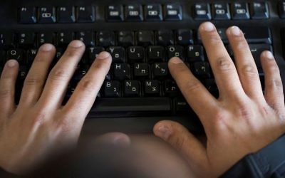 Illustrative: A man typing on a computer keyboard, January 24, 2017. (Flash90)