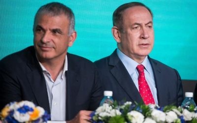 Finance Minister Moshe Kahlon, left, and Prime Minister Benjamin Netanyahu at a signing ceremony for an agreement to build thousands of new apartments in the ultra-Orthodox neighborhood of Ramat Beit Shemesh, April 03, 2017. (Hadas Parush/FLASH90) 