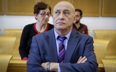 Former Joint List Knesset member Basel Ghattas arrives for a court hearing at the Beersheba Magistrate's Court, April 9, 2017.  (Yehuda Peretz/POOL/Flash90)