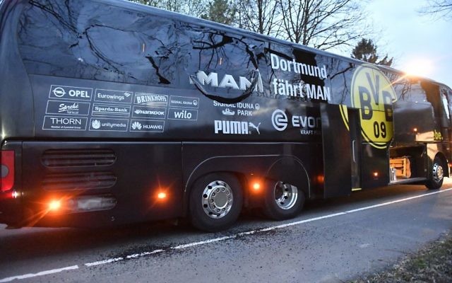 A window of Dortmund's team bus is damaged after an explosion before the Champions League quarterfinal soccer match between Borussia Dortmund and AS Monaco in Dortmund, Germany,  April 11, 2017. (AP/Martin Meissner)