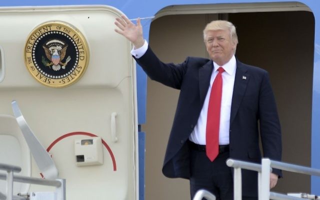 President Donald Trump arrives at Hartsfield Jackson International Airport, aboard Air Force One, Friday April 28, 2017, for a speech to the National Rifle Association's convention and a fundraiser for 6th District candidate Karen Handel. (Kent D. Johnson/Atlanta Journal-Constitution via AP)
