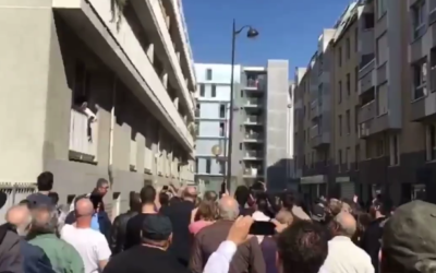 Some 1,000 members of France's Jewish community gathered outside the home of Sarah Halimi in Paris to commemorate her alleged anti-Semitic murder, April 9, 2017. (Screen capture: 0404 Video)
