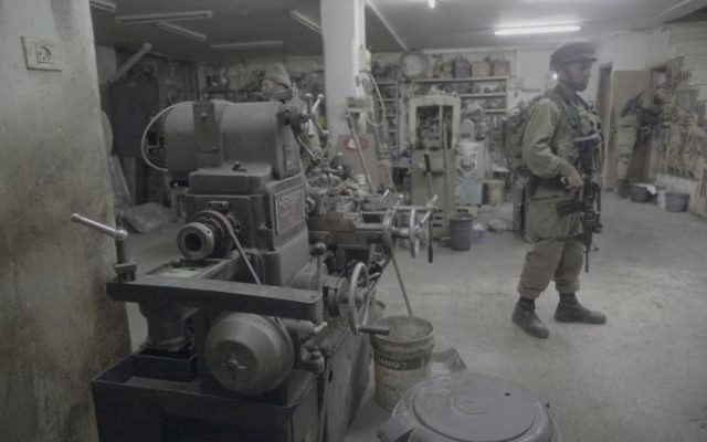 IDF soldiers seize machinery allegedly used to illegally make guns in Hebron on April 10, 2017. (IDF Spokesperson's Unit) 