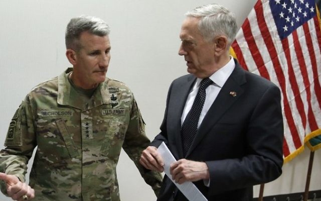 US Defense Secretary James Mattis, right, chats with US Army General John Nicholson, commander of US forces in Afghanistan, after a news conference at Resolute Support headquarters in Kabul, Afghanistan, April 24, 2017. (AFP/POOL/JONATHAN ERNST)