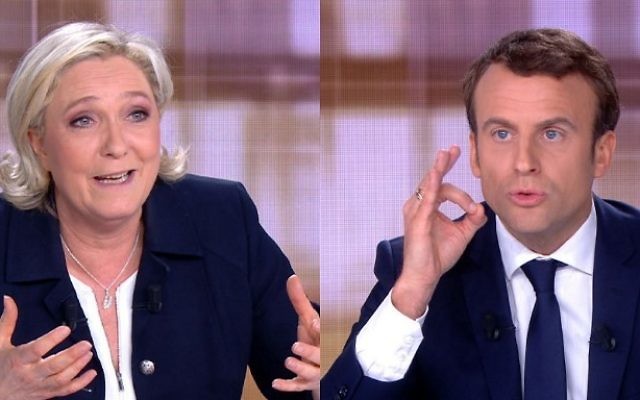A combination of video grabs from an AFP video taken on May 3, 2017 during a live televised debate shows French presidential candidates Marine Le Pen, left, and Emmanuel Macron, right, ahead of the second round of the French presidential election on May 7, 2017. (AFP Photo/Stringer)