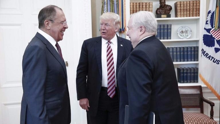 A handout photo made available by the Russian Foreign Ministry on May 10, 2017 shows US President Donald J. Trump (C) speaking with Russian Foreign Minister Sergei Lavrov (L) and Russian Ambassador to the U.S. Sergei Kislyak during a meeting at the White House in Washington, DC. (HO / RUSSIAN FOREIGN MINISTRY / AFP)