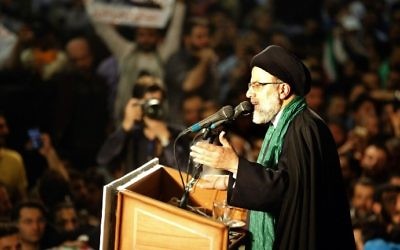 Iranian presidential candidate Ebrahim Raisi addresses his supporters during a campaign rally at Imam Khomeini Mosque in the capital Tehran on May 16, 2017. (AFP Photo/Atta Kenare)
