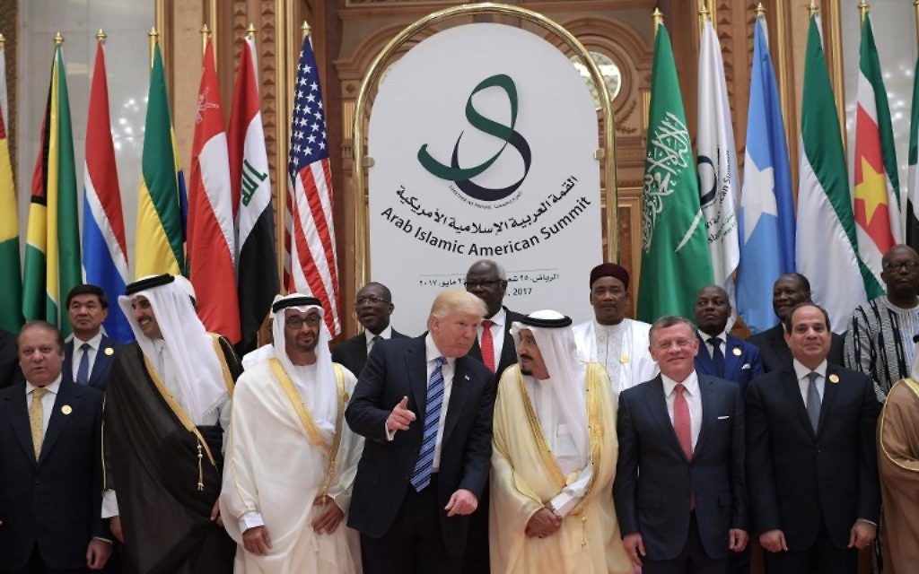 US President Donald Trump (center-left), Saudi Arabia's King Salman (center-right), and other leaders pose for a group photo during the Arabic Islamic American Summit at the King Abdulaziz Conference Center in Riyadh on May 21, 2017. (AFP/MANDEL NGAN)