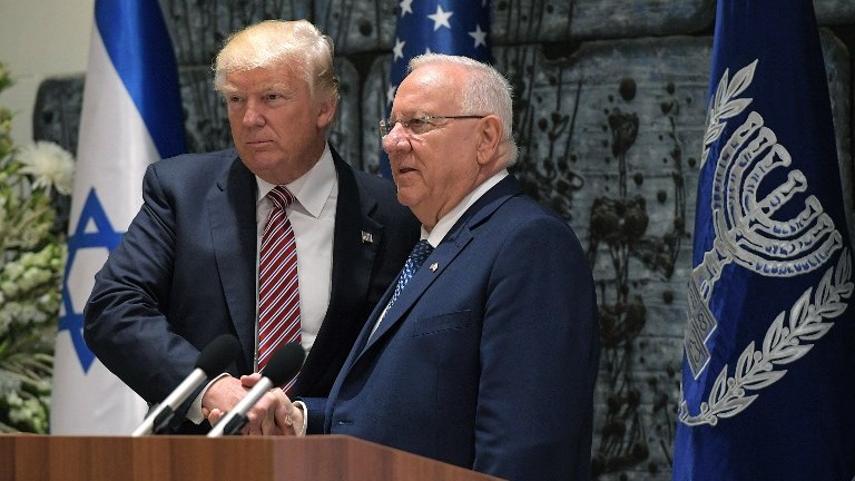 US President Donald Trump and President Reuven Rivlin shake hands following a press conference at the President's Residence in Jerusalem on May 22, 2017. (AFP Photo/Mandel Ngan)