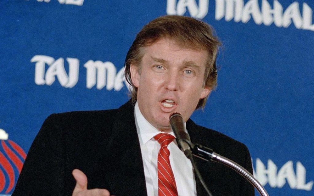 In this Feb. 28, 1989 file photo, real estate mogul Donald Trump speaks during a news conference in New York, announcing the opening of his Taj Mahal Resort Casino in Atlantic City, N.J. (AP Photo/David Cantor, File)