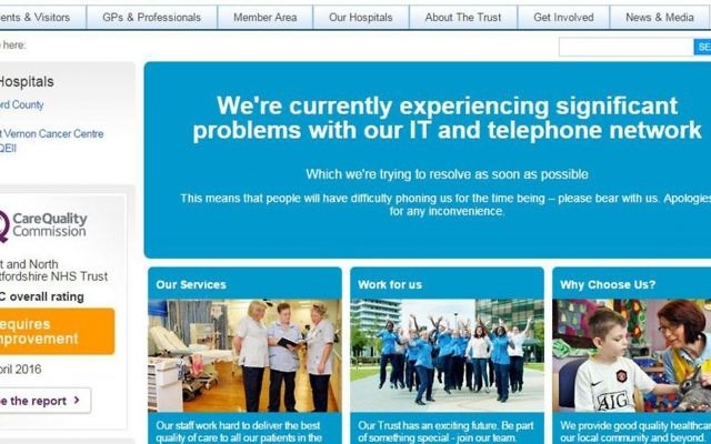 This is screengrab taken from the website of the East and North Hertfordshire NHS trust as Britain's National Health Service is investigating "an issue with IT" Friday May 12, 2017. Several British hospitals say they are having major computer problems Hospitals in London, northwest England and other parts of the country are reporting problems with their computer systems as the result of an apparent cyberattack,.(PA via AP)