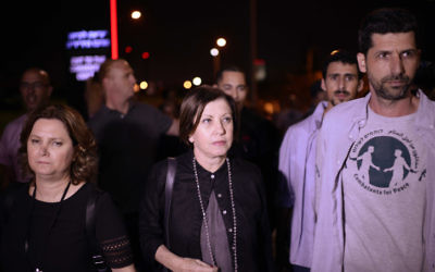 Meretz chairwoman Zehava Galon and Meretz MK Michal Rozin attend an Israeli-Palestinian memorial ceremony in Tel Aviv on April 30, 2017, as Israel marks its annual Memorial Day for fallen soldiers and victims of terror. (Tomer Neuberg/Flash90)